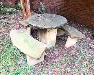 #370- Concrete table and three benches Table 23  inches wide by 33” t 
$300