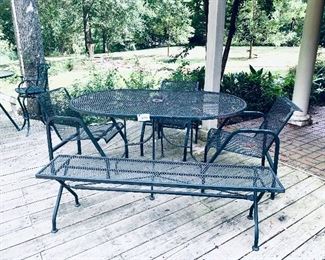 # 444- Metal patio set.  
Table 60 “ long. 4 chairs , 1 bench 
Lot $175