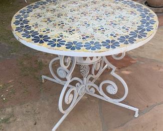 1960s MCM Wrought Iron Peacock Patio set Tile top table w/ 4 Chairs Table: 26.5in H x 35.5 diameter. Chairs:39.5x 22x20 in HxWxD