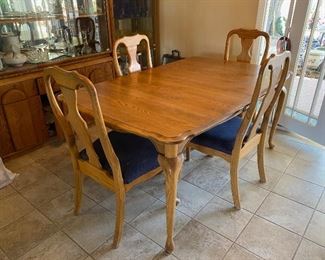 Solid Oak Dining Room Table & 4 chairs 2 Leafs	101 in. x 42 in. with leaf 66in. X 42in. Without	
