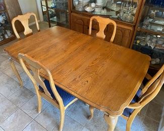 Solid Oak Dining Room Table & 4 chairs 2 Leafs	101 in. x 42 in. with leaf 66in. X 42in. Without	