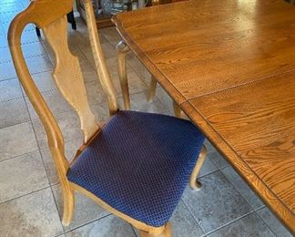 Solid Oak Dining Room Table & 4 chairs 2 Leafs	101 in. x 42 in. with leaf 66in. X 42in. Without	