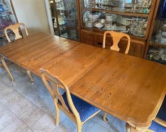 Solid Oak Dining Room Table & 4 chairs 2 Leafs	101 in. x 42 in. with leaf 66in. X 42in. Without	