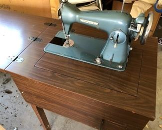 Vintage "Wizard" sewing machine w/cabinet