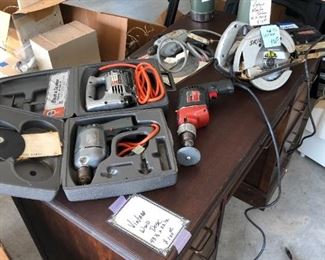 Several power tools and vintage thermos.