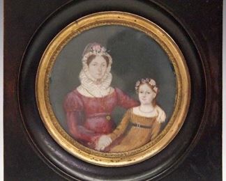 A 19th century American miniature portrait.  Watercolor and gouache image of a mother and daughter.  In a square painted frame with circular cast Brass liner.  Unsigned, not examined out of the frame.  Image 3 1/2", framed 6" square.  ESTIMATE $200-300