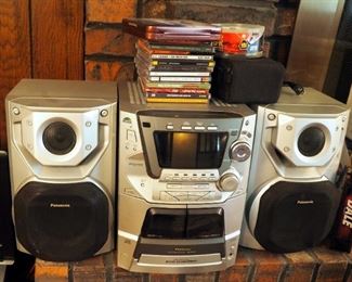 Panasonic Stereo System Model SA-AK66, Five CD Disc Changer, AM/FM Speakers QTY. 2 And CD Assortment