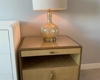 Ann Gish features bedside tables with gilded raffia coverings with bronzed metal trim 26"H X 26W X 20"D (Picture 1 of 5) Set of 2.  Sale Price $999