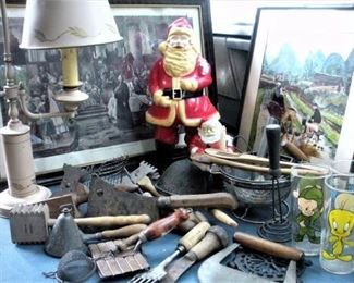 Santa watching over wonderful old woodenware kitchen utensils.  Tole Painted Lamp, and just a sampling of framed art work.