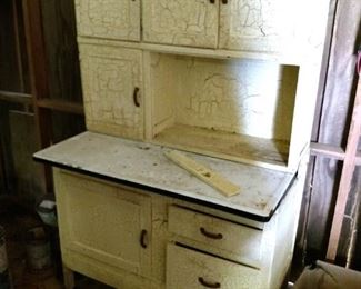 Antique hoosier cabinet with flour sifter