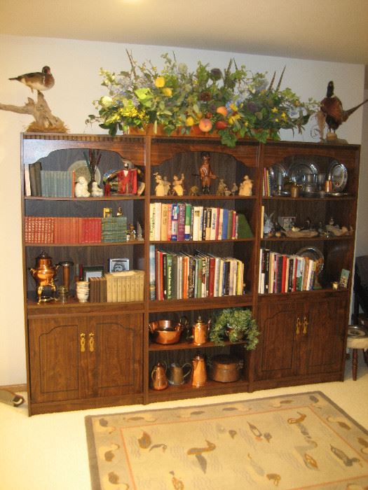 Trio of bookcases, copper, pewter, taxidermy, and books