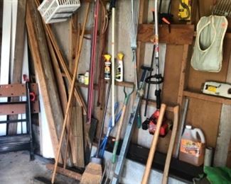 long handled tools-pickaxe, axe, push brooms, rakes, Homelite weed trimmer