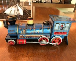 Vintage battery-operated tin train made by Modern Toys (Japan).
