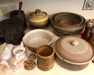 Large selection of pottery in the kitchen, including stoneware and artisan.