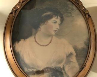 Vintage framed print of a young woman.