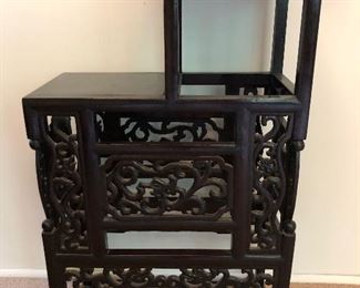 Ornate Asian shelves or table.