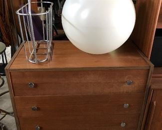 Modern four-drawer chest; large vintage plastic (or similar) globe shade for retro lamp.