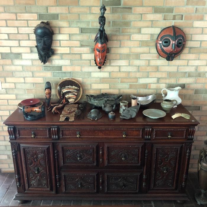 Berkey & Gay sideboard, highly carved with five drawers and two doors; sampling of numerous masks to be sold; exceptional selection of artwork from around the world.
