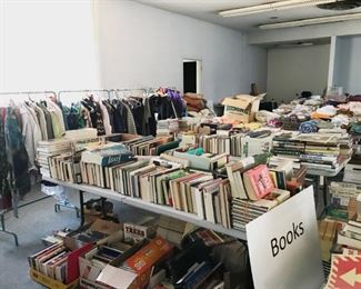 Hundreds of books, brand new clothing