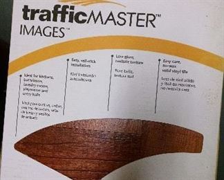   About 10 boxes floor tiles