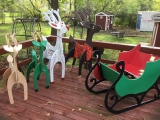 Wood advertising reindeer and sleigh (great craft project!), were $35 to $50, SALE $10 each