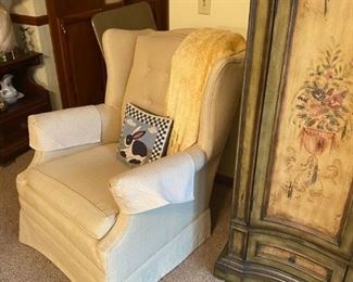 cream upholstered arm chair 