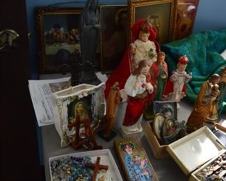 Vintage religious artifacts and rosary beads