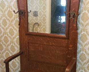 c1900's Honey Oak Hall Tree American Made and still has original Beveled Glass Mirror