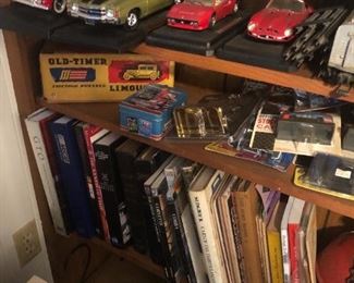 Various antique car books, die cast cars, car kits.