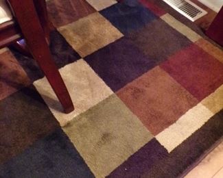 area rug in dining room