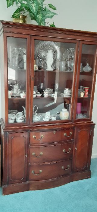 Beautiful display/china cabinet with lots of storage. 