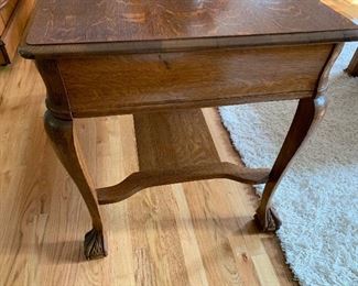 Gorgeous table with carved paw feet. It is 42" long, 26" wide by 29" tall. Lovely home filled with incredibly kept antiques, collectibles and home decor. Message, Text/ Call Steph at 518-944-0255! All items will be on www.loverantiques.com.