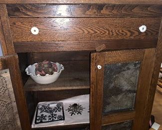 Our pie safe is in wonderful condition. Well cared for and used as a decorative piece for many years. Don’t miss this!