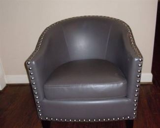 Dark Gray Barrel Chair with Large Silver Nailhead Accents