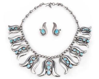1
A Set Of Frank Patania Sr. Sterling Silver Jewelry
Circa 1950s
Stamped verso for Frank Patania Sr., further stamped: Sterling
Comprising a necklace set with oval turquoise cabochons (17" L x 2" H) together with a pair of screw-back earrings (1 3/8" H x 5/8" W), 2 pieces
129.0 grams
Estimate: $2,000 - $3,000