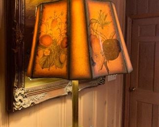 Brass lamp with ornate shade