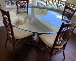 Dolphin base table with four chairs.. 