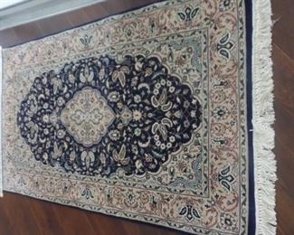 antique rug  approx. 5' x 2 1/2 ' $350
