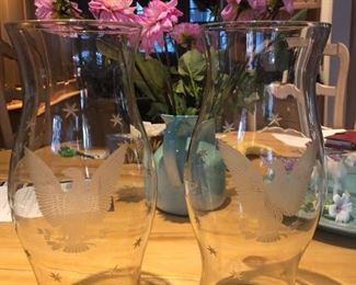 pair of glass candle protectors