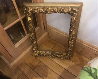 a golden repousse frame