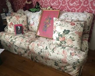 The needlepoint on the sleep couch which has, we understand, a specially confortable mattress