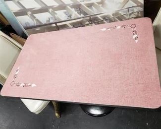 MCM Pink rectangular formica top with white & gray floral design on opposite corners, chrome trim & base cylinder with black painted round metal base Table only $295 Off-white vinyl swivel chairs on gold metallic legs Chairs only $295 Set complete $495