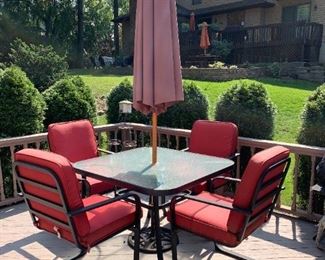 Patio glass top table with 4 chairs