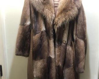 ONE OF SEVERAL FUR COATS