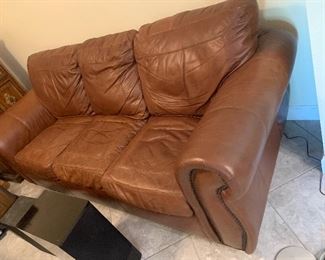 Leather pull-out sofa