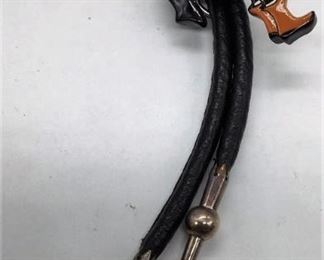 https://connect.invaluable.com/randr/auction-lot/1995-signed-zuni-clown-kachina-bolo-tie_28243DAAD8
