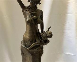 https://connect.invaluable.com/randr/auction-lot/antique-bronze-african-lady-maternity-sculpture_BB146D590A