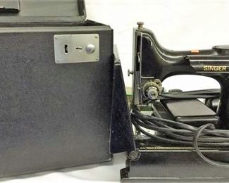 https://connect.invaluable.com/randr/auction-lot/singer-221-1-featherweight-sewing-machine-w-case-_14E49DB83C