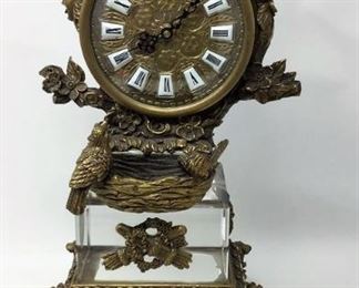 https://connect.invaluable.com/randr/auction-lot/antique-orante-bronze-mantle-clock-with-birds_4A44144823