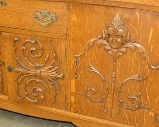 VIEW 7 CLOSEUP W/ CARVED HEADS 